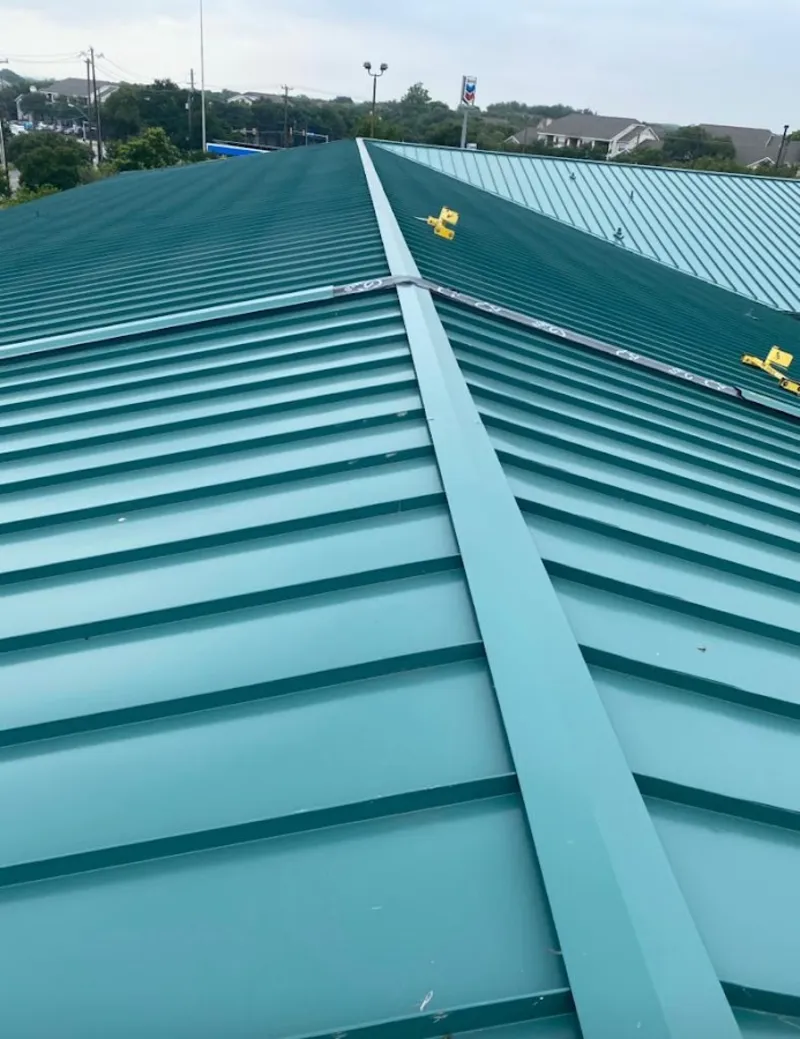 Green commercial metal roof ridge and valley for Metal Roof Repair in Casa de Oro-Mount Helix
